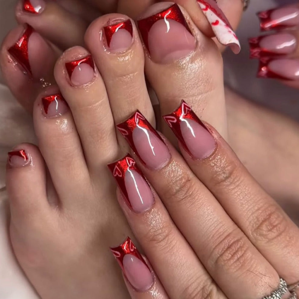 Sleek Red French Nails with Heart Fragments