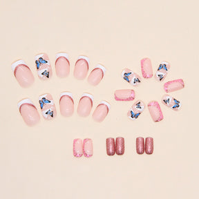 Blushing Pink Sparkle Nail Tips with Butterfly Design