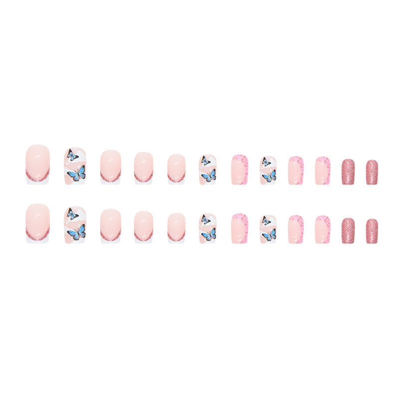 Blushing Pink Sparkle Nail Tips with Butterfly Design