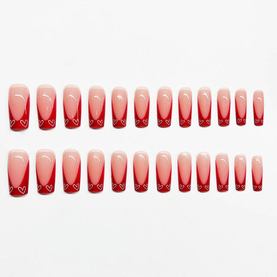 Sleek Red French Nails with Heart Fragments