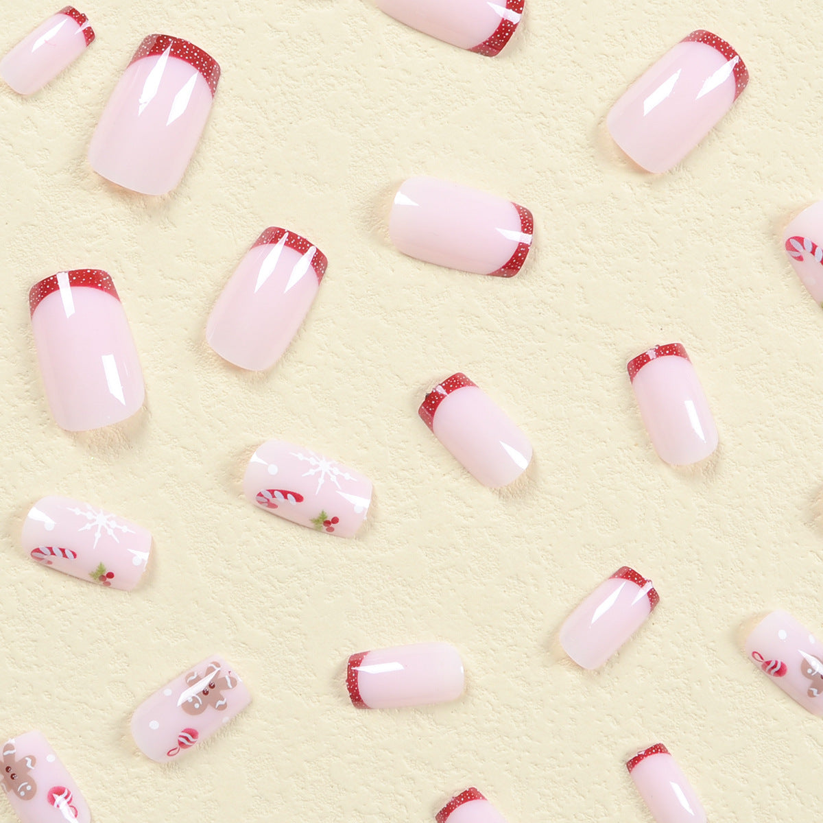 Cute Gingerbread Man and Candy Cane Christmas Nails