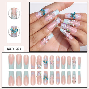 Long French Nail Extensions with Floral and Butterfly Design