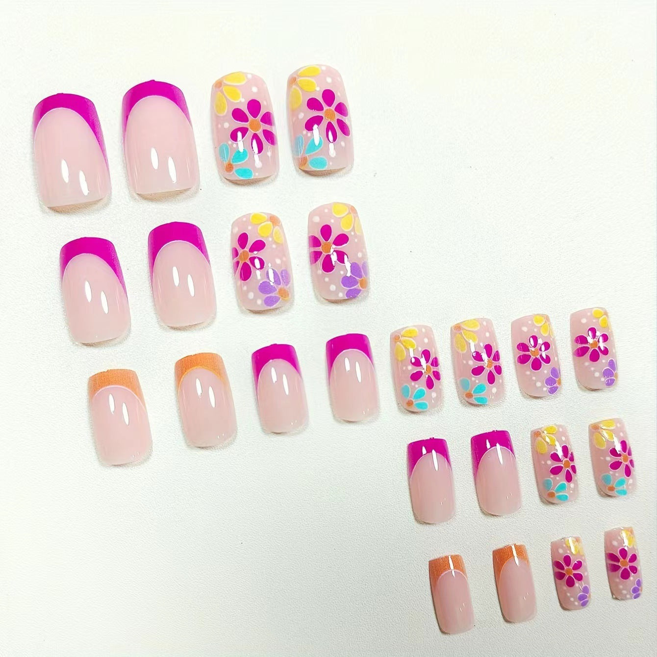 Cute Pink Orange French Nails with Floral Accents