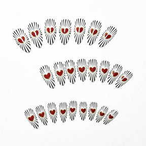 Valentine's Day Almond-Shaped Nails with Black Stripes and Red Hearts