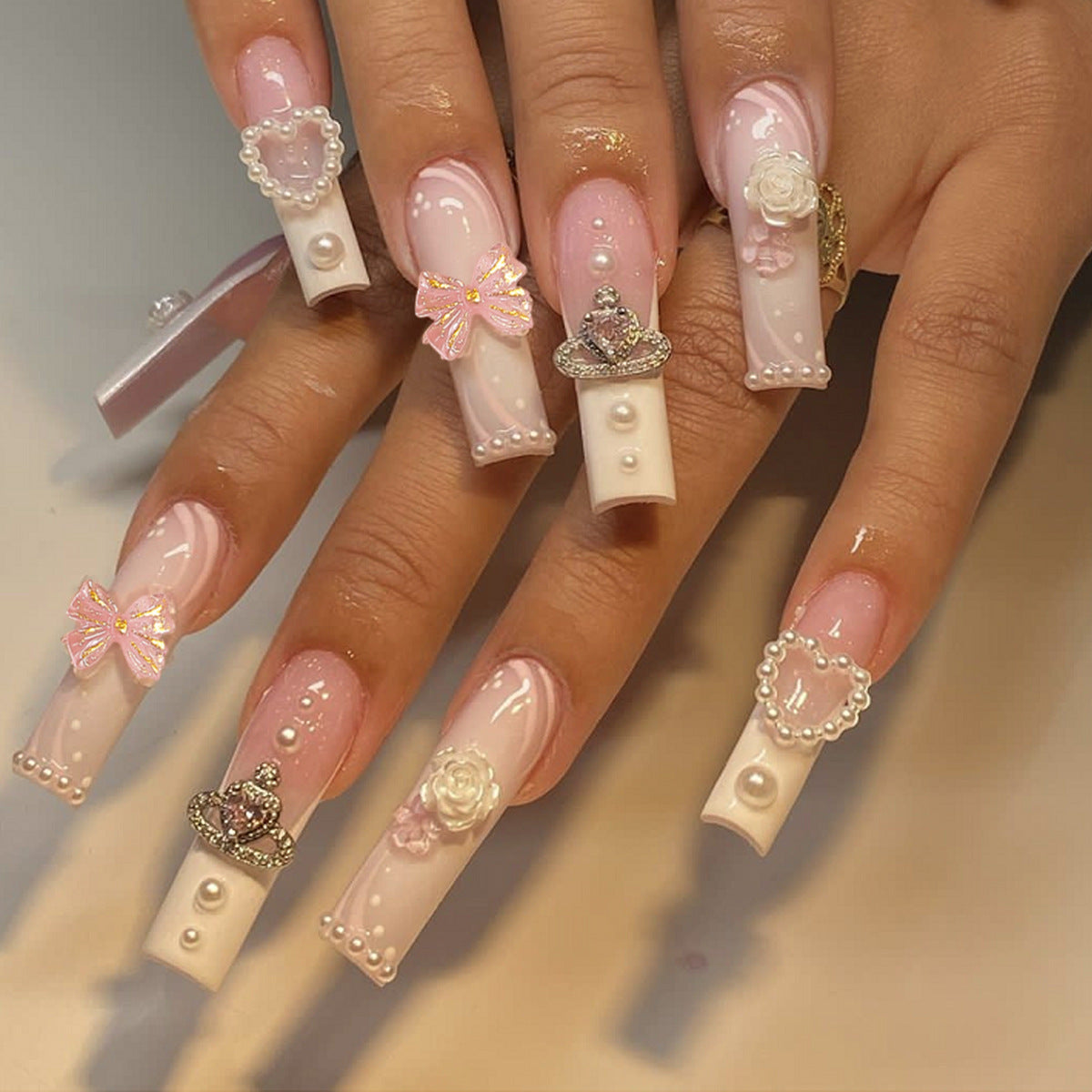 Long Stiletto French Nails with Bow, Pearl, and Heart