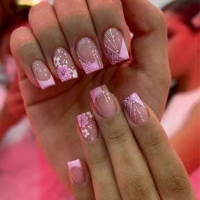 Pink French Nails with Shiny Star and Flower Accents