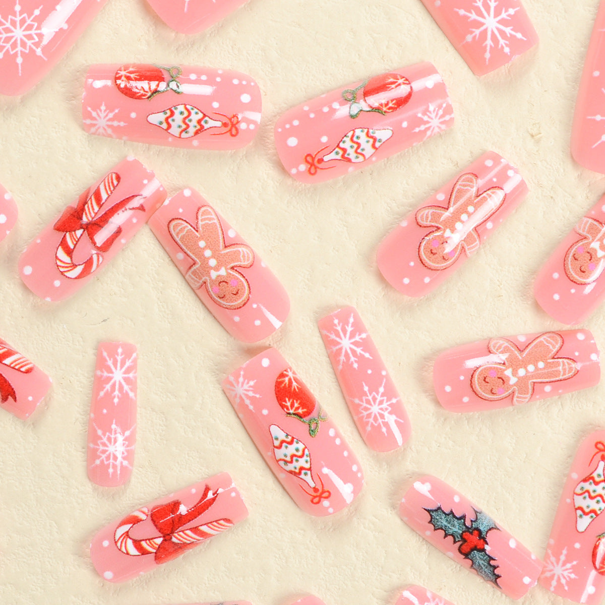 Cute Christmas Nails with Gingerbread Men and Candy Cane Designs