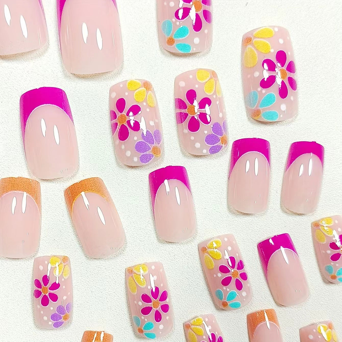 Cute Pink Orange French Nails with Floral Accents