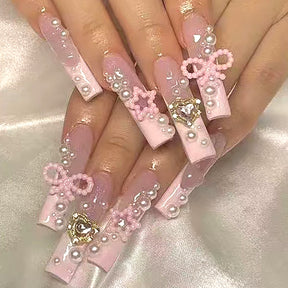 Charming Pink French Nail Tips with Pearls, Bow