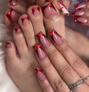 Sleek Red French Nails with Heart Fragments