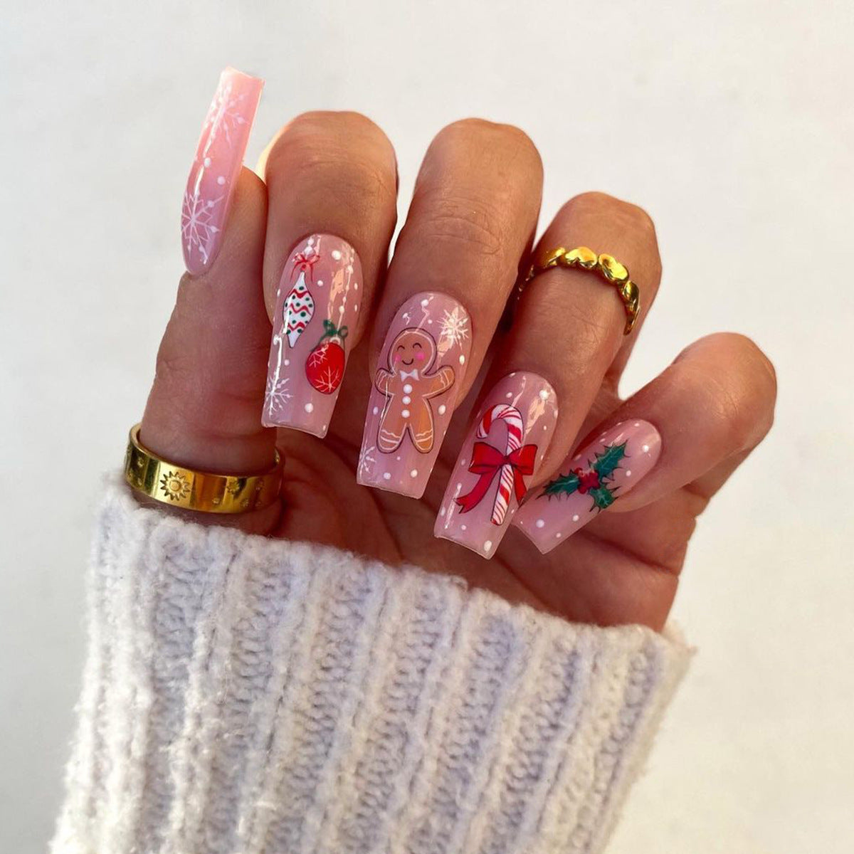 Cute Christmas Nails with Gingerbread Men and Candy Cane Designs