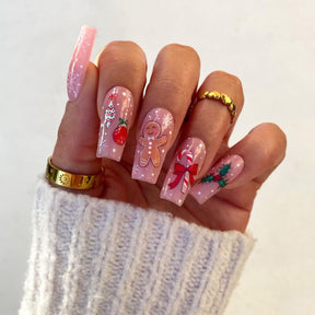 Cute Christmas Nails with Gingerbread Men and Candy Cane Designs