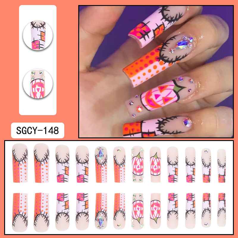 Spooky Pumpkin Nail Art with Crystal Accents