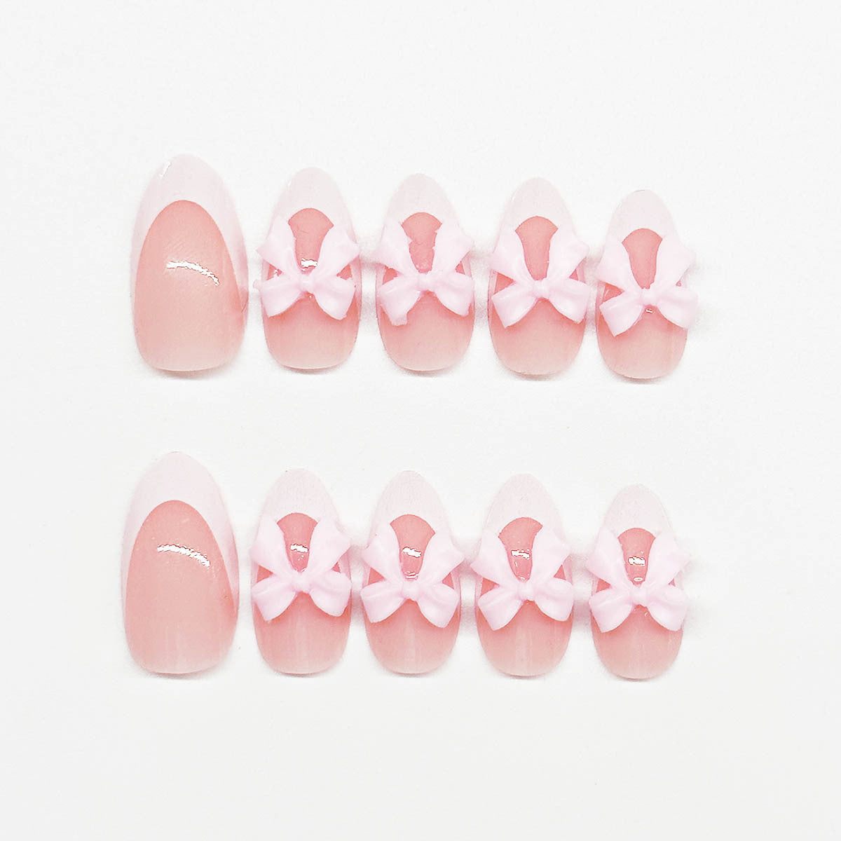 Short Almond White French Nails with Pink Bow Accents