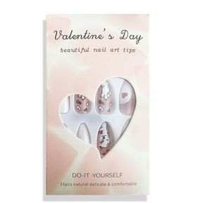 White Almond Nails with Cute Cat and Heart Designs