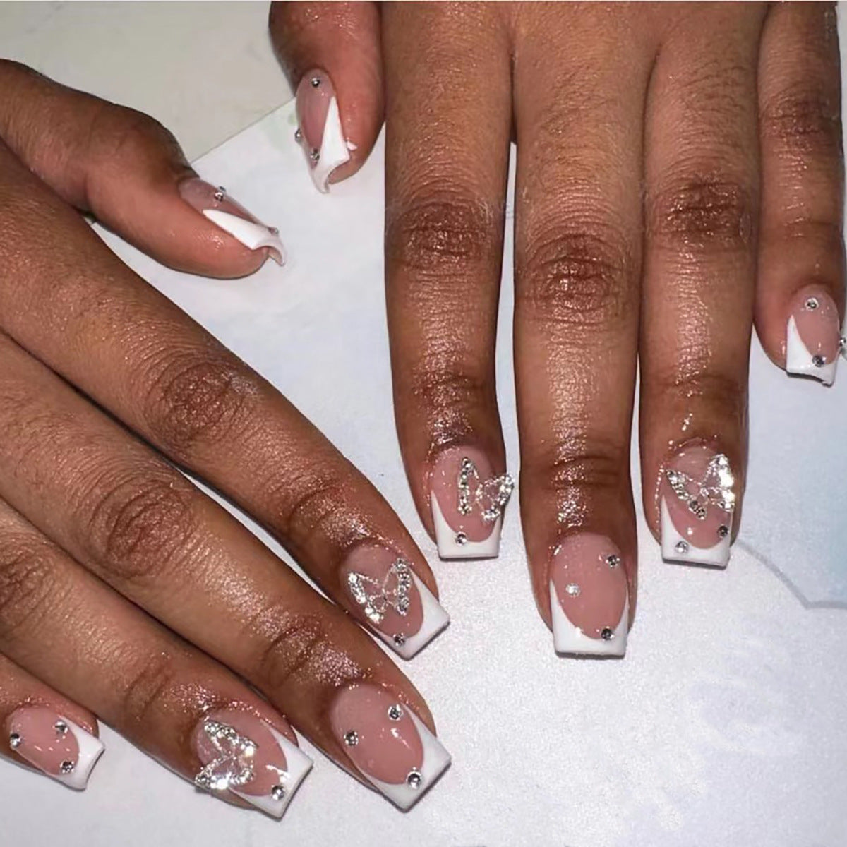 Simple Elegant White French Nails with Butterfly Design