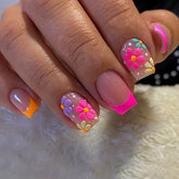 Cute Pink Orange French Nails with Floral Accents