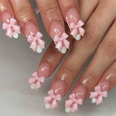 Short Almond White French Nails with Pink Bow Accents