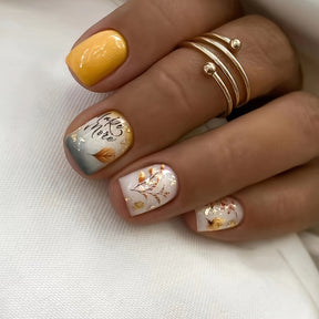 Warm Sunflower Nails with Leaf Print Design