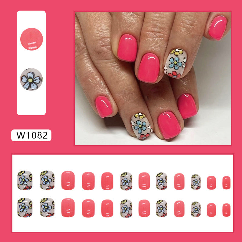 Short Anime-Style Floral Pink Nails for Fashionistas