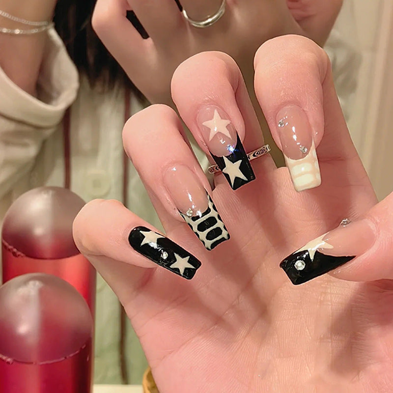 Black and Cream French Manicure Nails with Star Accents