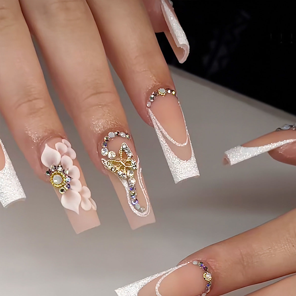 Long French Nail Extensions with Flowers, Diamonds, Butterflies