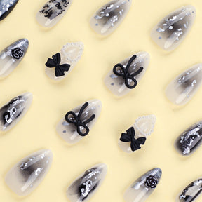 Black 3D Bow Nail Tips with Pearls and Glitter