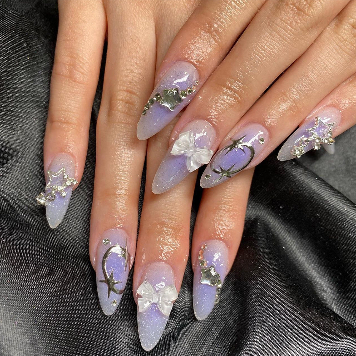 Purple Nail Tips with Star Glitter and Bow Design