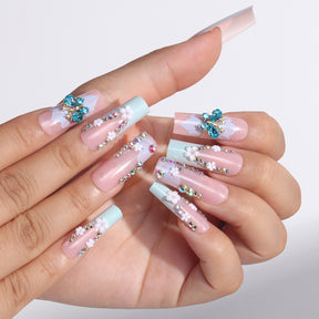 Long French Nail Extensions with Floral and Butterfly Design